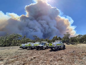 Smoke billows from an out of control bushfire in the Grampians National Park