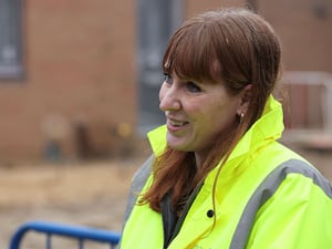 Deputy Prime Minister Angela Rayner wears a hi-vis jacket during a visit to a construction site in Cambridge