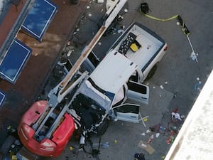 A damaged pickup truck seen from above