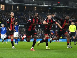 Dango Ouattara, second left, celebrates with team-mates after scoring Bournemouth’s winner against Ipswich