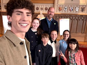 Blue Peter presenter Joel Mawhinney, competition winners Annie, Llewyn, Mia, Ruby and Marni with the Prince of Wales