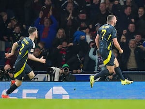 John McGinn jumps for joy