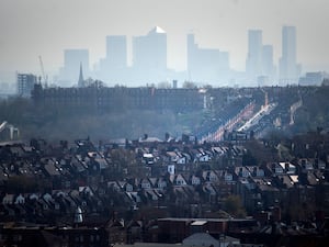 The Canary Wharf skyline viewed through the haze from Alexandra Palace, north London