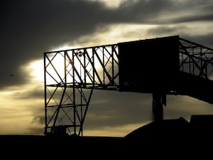 Low sun behind a colliery