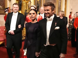 David and Victoria Beckham at Buckingham Palace during the state visit of Emir of Qatar Sheikh Tamim bin Hamad Al Thani in December