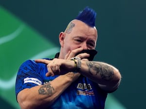 Peter Wright fights back the tears after upsetting world champion Luke Humphries