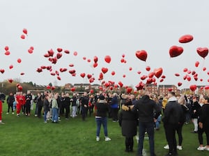 Red balloons were released at an event in memory of Liberty Charris following her death in 2022