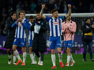 Espanyol players celebrate after victory against Real Madrid