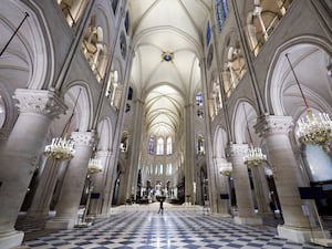 The gleaming nave of the restored Notre Dame Cathedral