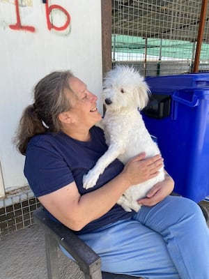 Louise with Connie, who was rescued from extreme neglect  in Iraq and now lives in the UK