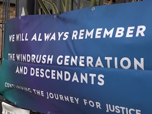 A Windrush campaign banner