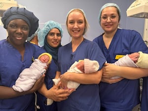 Maternity staff with the triplets who were delivered at the Midland Met. 