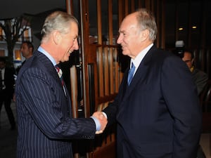 Charles with the Aga Khan (Anthony Delvin/PA)