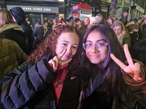 Friends enjoying the Christmas lights switch on