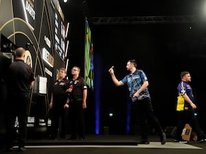 Luke Humphries, second right, in action during night two of the 2025 Premier League in Glasgow