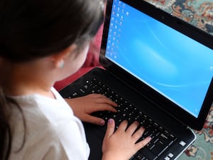 A child using a laptop