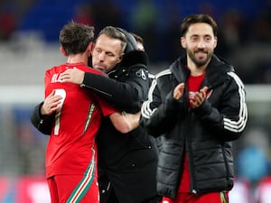 Craig Bellamy hugs Joe Allen