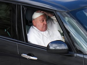 Pope Francis in a car after presiding over a Mass