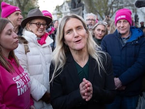 Kim Leadbeater speaks to journalists in Parliament Square, surrounded by supporters of assisted dying