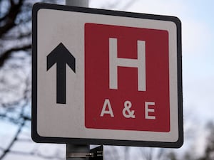 A street sign indicating a hospital