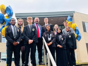 Windsor High School and Sixth Form Headteacher, Stephen Lanckham,
celebrates Ofsted judgement of ‘Outstanding in all judgement areas’ with students at the
school.