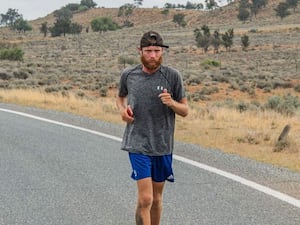 A man running in the wilderness