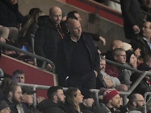 Liverpool manager Arne Slot watches on from the stands