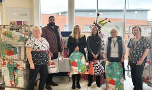 As part of its Christmas Gift Tag Appeal, Flexeserve Partners Harvinder Chahal, Holly Francis, Jane Cornwell and Julie Cartwright are pictured delivering gifts for children staying in University Hospitals Coventry and Warwickshire over the festive period