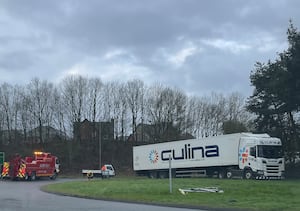 A lorry was beached on a roundabout in Newport. 