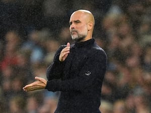 Manchester City manager Pep Guardiola reacts to a missed chance during his side's defeat by Tottenham