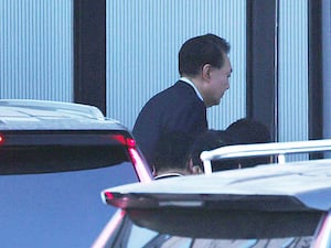 Impeached South Korean President Yoon Suk Yeol arrives at the Corruption Investigation Office for High-ranking Officials in Gwacheon