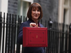 Chancellor of the Exchequer Rachel Reeves holding her red ministerial box outside 11 Downing Street