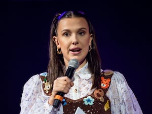 Millie Bobby Brown speaks at a Teenage Cancer Trust Concert in 2022