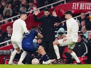 Arsenal manager Mikel Arteta, centre, watches the action