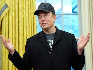 Elon Musk speaks during an event in the Oval Office at the White House