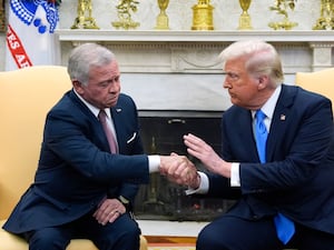 President Donald Trump greets Jordan’s King Abdullah II in the Oval Office at the White House