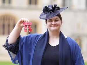 Paralympian Sabrina Fortune holding a medal