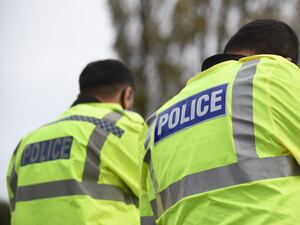 Two police officers in hi-vis jackets