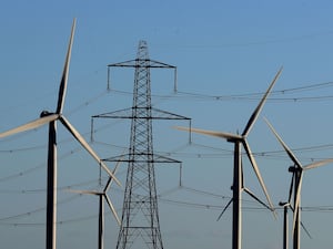 A wind farm and pylon