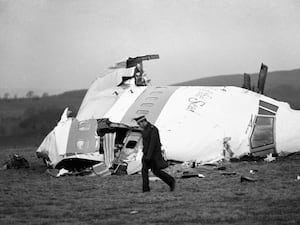 The wrecked nose section of the Pan-Am Boeing 747 lies in field following the explosion