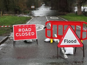 Road closed and flood signs