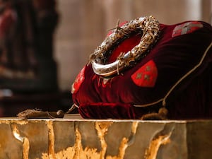 Crown of Thorns relic on a red cushion