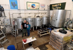 Dave and Carol Kelly work at least once a week to brew beers at the site