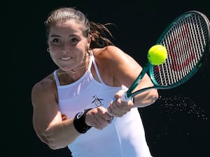 Jodie Burrage strikes a backhand