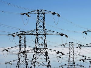 Pylons against blue sky