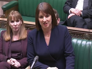 Rachel Reeves speaking in the House of Commons with Angela Rayner in the background