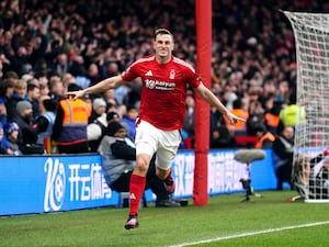 Chris Wood celebrates scoring against Brighton