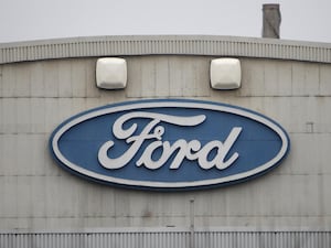 A sign for the car manufacturer Ford