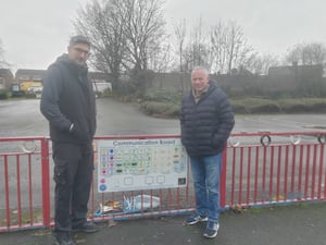 Amritpal Singh Kang, also known as Bobby, and Councillor Stuart Henley with the new board