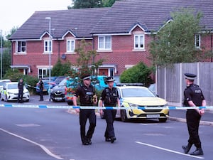 Police officers and vehicles near Axel Rudakubana's home in Old School Close, Banks, near Southport